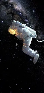 Astronaut floating in space with stars and galaxy background.