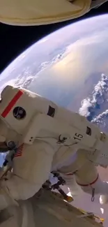 Astronaut floating in space with Earth in view.