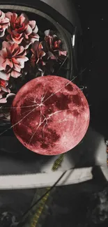 Astronaut helmet with pink flowers and a red moon, dark background.