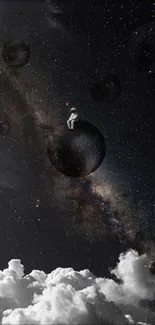 Astronaut sitting on a planet against a galaxy-filled sky.