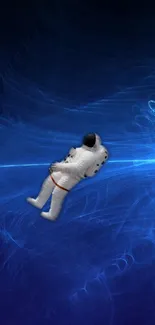 Astronaut floating in space with electric blue background.