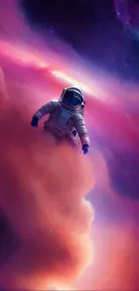 Astronaut floating in vibrant space nebula with purple and orange hues.