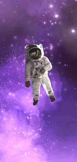 Astronaut floating in a vibrant purple cosmic nebula.