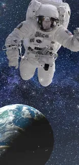 Astronaut floating in space above Earth in a starry galaxy background.