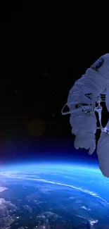 Astronaut floats in space above Earth with moon in background.