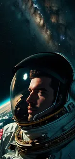 Astronaut gazing at Earth with a galaxy background.