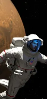 Astronaut in white spacesuit near red planet Mars.