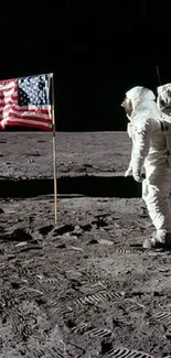 Astronaut standing on the moon with American flag.