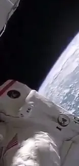 Astronaut view of Earth from space with dark sky backdrop.