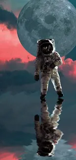 Astronaut reflecting under the moon with a teal and pink sky.