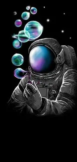 Astronaut blowing colorful bubbles on black background wallpaper.