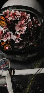 Astronaut helmet filled with flowers and butterflies on a dark background.