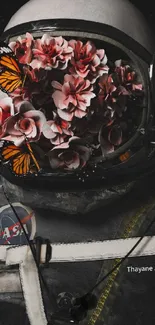 Astronaut helmet with flowers and butterflies on a galaxy-themed background.