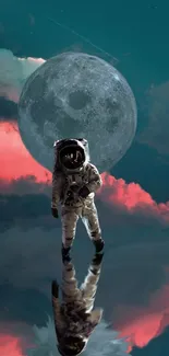 Astronaut standing in front of a large full moon with pink clouds in the background.