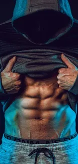 Person in hoodie revealing toned abs under dramatic lighting.