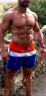 Athletic individual in orange shorts and blue shoes standing outdoors.