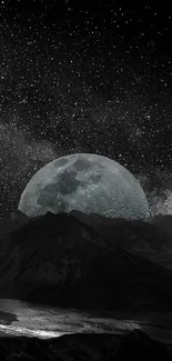 Moonlit mountain with starry night sky.