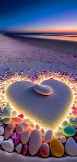 Heart-shaped pebble design on a beach at sunset, glowing softly.