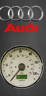 Gray Audi wallpaper with logo and speedometer design.