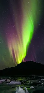 Mobile wallpaper featuring the Aurora Borealis over a mountainous icy landscape.