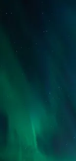 Dark green aurora borealis illuminating the night starry sky.