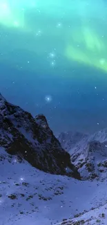 Northern lights over snowcapped mountains at night.