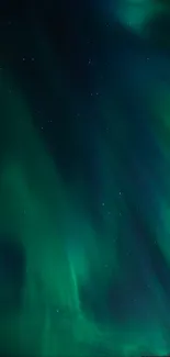 Vibrant green aurora borealis against a starry night sky.