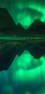 Stunning Aurora Borealis reflecting on tranquil water under a night sky.