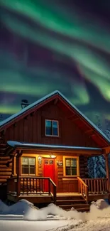 Winter cabin under northern lights in snow.