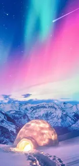 Beautiful winter igloo under vibrant aurora in a snowy mountain landscape.