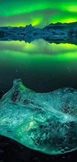 Stunning green aurora over icy landscape with serene reflections.