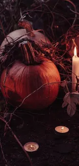 Autumn scene with pumpkins and candles on a dark evening background.