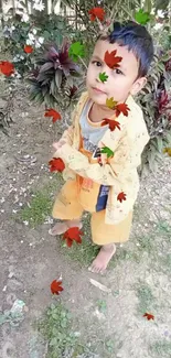 Child standing in garden with falling leaves.