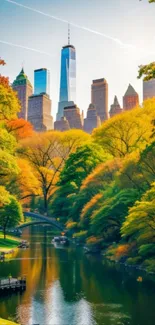 Autumn cityscape with skyline and fall foliage reflected in a serene lake.