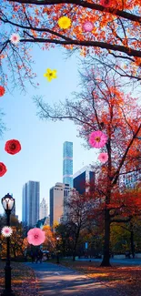 Autumn cityscape wallpaper with vibrant red leaves and clear blue sky.