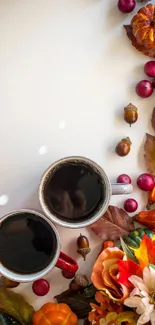 Autumn themed mobile wallpaper with coffee cups and fall decorations.