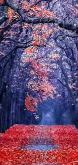 Serene forest path with vibrant red autumn leaves.