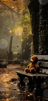 Teddy bear on a bench in an autumn forest with falling leaves.