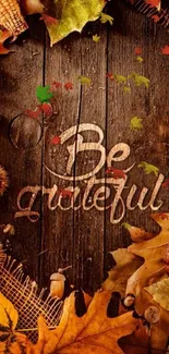 Autumn-themed wallpaper with 'Be Grateful' text and fall leaves.