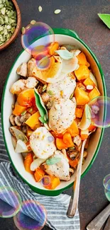 Colorful autumn dish with chicken and veggies in a bowl.