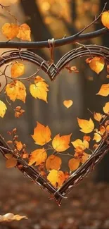 Heart-shaped twig frame with autumn leaves, set in a forest.