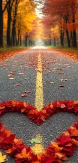 Heart-shaped autumn leaves on a road.