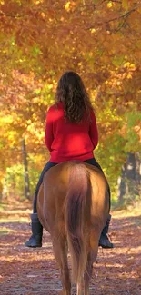 A serene autumn horseback ride through a forest path with vibrant fall leaves.