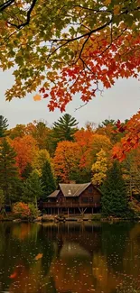Serene autumn cabin by a lake with colorful foliage.
