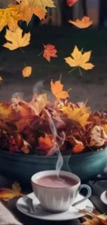 Steaming tea cup amidst autumn leaves on table.