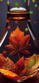 Vibrant autumn leaves in glass vase wallpaper.