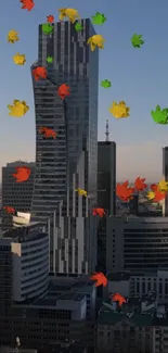 Autumn leaves cascade over a city skyline.