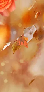 Warm autumn leaves wallpaper with orange tones and soft bokeh.