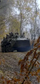 Military vehicle in autumn forest, vivid nature scene.