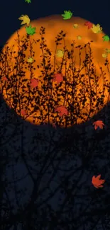 Orange moonlit night with colorful leaves and tree silhouettes.